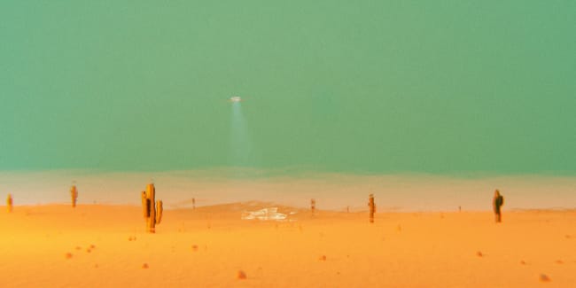 Desert landscape with cactus and UFO